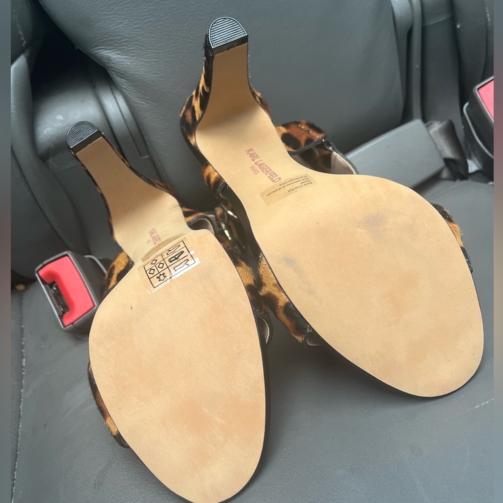 Never worn leopard heeled sandals!